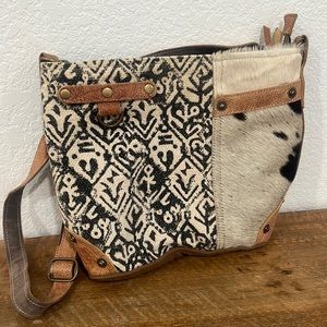myra cowhide bag. like new.
